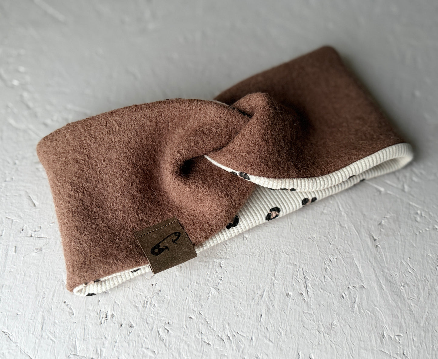 Knotenstirnband aus Wollwalk „L E O“